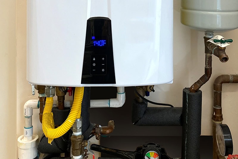 What Is a Point-of-Use Tankless Water Heater? Photo of a tankless water heater.